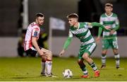 4 March 2024; Dylan Watts of Shamrock Rovers in action against Michael Duffy of Derry City during the SSE Airtricity Men's Premier Division match between Shamrock Rovers and Derry City at Tallaght Stadium in Dublin. Photo by David Fitzgerald/Sportsfile