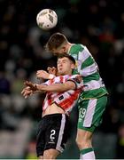 4 March 2024; Ronan Boyce of Derry City in action against Markus Poom of Shamrock Rovers during the SSE Airtricity Men's Premier Division match between Shamrock Rovers and Derry City at Tallaght Stadium in Dublin. Photo by Stephen McCarthy/Sportsfile