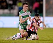 4 March 2024; Patrick Hoban of Derry City in action against Josh Honohan of Shamrock Rovers during the SSE Airtricity Men's Premier Division match between Shamrock Rovers and Derry City at Tallaght Stadium in Dublin. Photo by Stephen McCarthy/Sportsfile