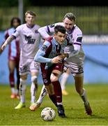 4 March 2024; Evan Weir of Drogheda United in action against Sten Reinkort of Bohemians during the SSE Airtricity Men's Premier Division match between Drogheda United and Bohemians at Weavers Park in Drogheda, Louth. Photo by Ben McShane/Sportsfile