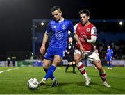4 March 2024; Darragh Leahy of Waterford in action against Ruairí Keating of St Patrick's Athletic during the SSE Airtricity Men's Premier Division match between Waterford and St Patrick's Athletic at the Regional Sports Centre in Waterford. Photo by Piaras Ó Mídheach/Sportsfile