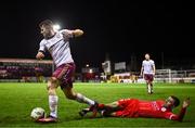 4 March 2024; Regan Donelon of Galway United is tackled by Dean Williams of Shelbourne during the SSE Airtricity Men's Premier Division match between Shelbourne and Galway United at Tolka Park in Dublin. Photo by Harry Murphy/Sportsfile
