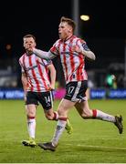 4 March 2024; Cameron McJannet and Ben Doherty, left, of Derry City celebrate their second goal scored by Danny Mullen, not pictured, during the SSE Airtricity Men's Premier Division match between Shamrock Rovers and Derry City at Tallaght Stadium in Dublin. Photo by Stephen McCarthy/Sportsfile