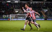 4 March 2024; Cameron McJannet and Ben Doherty, left, of Derry City celebrate their second goal scored by Danny Mullen, not pictured, during the SSE Airtricity Men's Premier Division match between Shamrock Rovers and Derry City at Tallaght Stadium in Dublin. Photo by Stephen McCarthy/Sportsfile