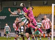 4 March 2024; Derry City goalkeeper Brian Maher in action against Josh Honohan of Shamrock Rovers during the SSE Airtricity Men's Premier Division match between Shamrock Rovers and Derry City at Tallaght Stadium in Dublin. Photo by David Fitzgerald/Sportsfile