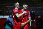 4 March 2024; John Martin of Shelbourne celebrates with teammate Will Jarvis after scoring his side's first goal during the SSE Airtricity Men's Premier Division match between Shelbourne and Galway United at Tolka Park in Dublin. Photo by Harry Murphy/Sportsfile