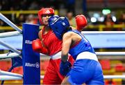 6 March 2024; Emilie Sonvico of France, left, in action against Boro Ankushita of India during their Women's 66kg Round of 64 bout during day four at the Paris 2024 Olympic Boxing Qualification Tournament at E-Work Arena in Busto Arsizio, Italy. Photo by Ben McShane/Sportsfile