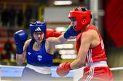 6 March 2024; Karolina Makhno of Ukraine, right, in action against Vasiliki Stavridou of Greece during their Women's 75kg Round of 32 bout during day four at the Paris 2024 Olympic Boxing Qualification Tournament at E-Work Arena in Busto Arsizio, Italy. Photo by Ben McShane/Sportsfile