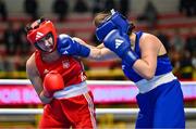 6 March 2024; Karolina Makhno of Ukraine, left, in action against Vasiliki Stavridou of Greece during their Women's 75kg Round of 32 bout during day four at the Paris 2024 Olympic Boxing Qualification Tournament at E-Work Arena in Busto Arsizio, Italy. Photo by Ben McShane/Sportsfile