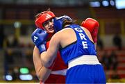 6 March 2024; Karolina Makhno of Ukraine, left, in action against Vasiliki Stavridou of Greece during their Women's 75kg Round of 32 bout during day four at the Paris 2024 Olympic Boxing Qualification Tournament at E-Work Arena in Busto Arsizio, Italy. Photo by Ben McShane/Sportsfile