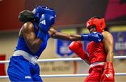 6 March 2024; Chantelle Reid of Great Britain, right, in action against Eyed Angel George of Trinidad & Tobago during their Women's 75kg Round of 32 bout during day four at the Paris 2024 Olympic Boxing Qualification Tournament at E-Work Arena in Busto Arsizio, Italy. Photo by Ben McShane/Sportsfile