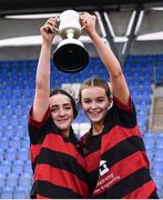6 March 2024; St Mary's Arklow players Emma Gannon, left, and Ruby Tracey celebrate with the cup after their side's victory in the Bank of Ireland Leinster Rugby Schools Girls’ Junior final match between St Mary's New Ross and St Mary's Arklow at Energia Park in Dublin. Photo by Piaras Ó Mídheach/Sportsfile