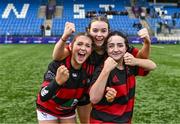 6 March 2024; St Mary's Arklow players, from left, Shyne Leonard, Ruby Tracey and Emma Gannon, celebrate after their side's victory in the Bank of Ireland Leinster Rugby Schools Girls’ Junior final match between St Mary's New Ross and St Mary's Arklow at Energia Park in Dublin. Photo by Piaras Ó Mídheach/Sportsfile