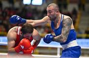 6 March 2024; Berat Acar of Türkiye, left, in action against Georgii Kushiashvili of Georgia during their Men's 92kg Round of 64 bout during day four at the Paris 2024 Olympic Boxing Qualification Tournament at E-Work Arena in Busto Arsizio, Italy. Photo by Ben McShane/Sportsfile