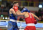 6 March 2024; Vagkan Ninitzanian of Greece, right, in action against Adrian Paoletti of Australia during their Men's 92kg Round of 64 bout during day four at the Paris 2024 Olympic Boxing Qualification Tournament at E-Work Arena in Busto Arsizio, Italy. Photo by Ben McShane/Sportsfile