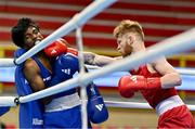 6 March 2024; Kiaran MacDonald of Great Britain, right, in action against Jokhu Al-Jaleel Ortega of Trinidad & Tobago during their Men's 51kg Round of 32 bout during day four at the Paris 2024 Olympic Boxing Qualification Tournament at E-Work Arena in Busto Arsizio, Italy. Photo by Ben McShane/Sportsfile