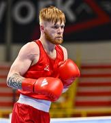 6 March 2024; Kiaran MacDonald of Great Britain in action against Jokhu Al-Jaleel Ortega of Trinidad & Tobago during their Men's 51kg Round of 32 bout during day four at the Paris 2024 Olympic Boxing Qualification Tournament at E-Work Arena in Busto Arsizio, Italy. Photo by Ben McShane/Sportsfile