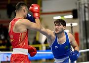 6 March 2024; Rustem Mammedov of Turkmenistan, right, in action against Danabieke Bayikewuzi of China during their Men's 92kg+ Round of 32 bout during day four at the Paris 2024 Olympic Boxing Qualification Tournament at E-Work Arena in Busto Arsizio, Italy. Photo by Ben McShane/Sportsfile