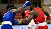 6 March 2024; Fernando Arzola of Cuba, left, in action against Diarga Balde of Senegal during their Men's 92kg+ Round of 32 bout during day four at the Paris 2024 Olympic Boxing Qualification Tournament at E-Work Arena in Busto Arsizio, Italy. Photo by Ben McShane/Sportsfile