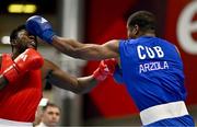 6 March 2024; Fernando Arzola of Cuba, right, in action against Diarga Balde of Senegal during their Men's 92kg+ Round of 32 bout during day four at the Paris 2024 Olympic Boxing Qualification Tournament at E-Work Arena in Busto Arsizio, Italy. Photo by Ben McShane/Sportsfile