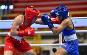 7 March 2024; Angelyris Lopes of Puerto Rico, left, in action against Shera Mae Patricio of USA during their Women's 54kg Round of 32 bout during day five at the Paris 2024 Olympic Boxing Qualification Tournament at E-Work Arena in Busto Arsizio, Italy. Photo by Ben McShane/Sportsfile