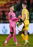 4 March 2024; Derry City goalkeeper Brian Maher and Shamrock Rovers goalkeeper Leon Pohls, right, after the SSE Airtricity Men's Premier Division match between Shamrock Rovers and Derry City at Tallaght Stadium in Dublin. Photo by Stephen McCarthy/Sportsfile