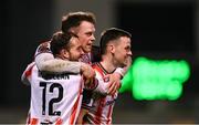 4 March 2024; Derry City players, from left, Paul McMullan, Cameron McJannet and Ben Doherty celebrate after team-mate Danny Mullen, not pictured, scored their second goal during the SSE Airtricity Men's Premier Division match between Shamrock Rovers and Derry City at Tallaght Stadium in Dublin. Photo by Stephen McCarthy/Sportsfile