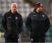 4 March 2024; Derry City manager Ruaidhrí Higgins and assistant manager Paul Hegarty, left, before the SSE Airtricity Men's Premier Division match between Shamrock Rovers and Derry City at Tallaght Stadium in Dublin. Photo by Stephen McCarthy/Sportsfile