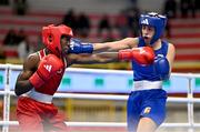 7 March 2024; Jenifer Fernandez Romero of Spain, right, in action against Mariatou Diallo of Senegal during their Women's 57kg Round of 32 bout during day five at the Paris 2024 Olympic Boxing Qualification Tournament at E-Work Arena in Busto Arsizio, Italy. Photo by Ben McShane/Sportsfile