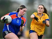 7 March 2024; Amy Staunton of Mary Immaculate College in action against Caitlin O'Reilly of DCU Dochas Eireann during the 2024 Ladies HEC Cup final match between DCU Dochas Eireann and Mary Immaculate College at MTU Cork. Photo by Stephen Marken/Sportsfile