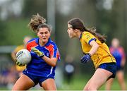 7 March 2024; Sarah Fitzgerald of Mary Immaculate College in action against Lily Rooney of DCU Dochas Eireann during the 2024 Ladies HEC Cup final match between DCU Dochas Eireann and Mary Immaculate College at MTU Cork. Photo by Stephen Marken/Sportsfile