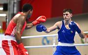 7 March 2024; Aidan Walsh of Ireland, right, in action against Wanderson De Oliveira of Brazil during their Men's 71kg Round of 32 bout during day five at the Paris 2024 Olympic Boxing Qualification Tournament at E-Work Arena in Busto Arsizio, Italy. Photo by Ben McShane/Sportsfile