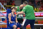 7 March 2024; Aidan Walsh of Ireland, with Ireland coaches Damian Kennedy, centre, and Zaur Antia, during their Men's 71kg Round of 32 bout against Wanderson De Oliveira of Brazil during day five at the Paris 2024 Olympic Boxing Qualification Tournament at E-Work Arena in Busto Arsizio, Italy. Photo by Ben McShane/Sportsfile