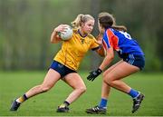 7 March 2024; Amy Clavin of DCU Dochas Eireann in action against Ellen Browne of Mary Immaculate College during the 2024 Ladies HEC Cup final match between DCU Dochas Eireann and Mary Immaculate College at MTU Cork. Photo by Stephen Marken/Sportsfile