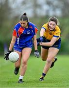 7 March 2024; Grace O'Connor of Mary Immaculate College in action against Hazel Prior of DCU Dochas Eireann during the 2024 Ladies HEC Cup final match between DCU Dochas Eireann and Mary Immaculate College at MTU Cork. Photo by Stephen Marken/Sportsfile
