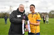 7 March 2024; Louise Pearl of DCU Dochas Eireann is presented with the Cup by Daniel Caldwell, Chairperson Ladies HEC, following the 2024 Ladies HEC Cup Final between DCU Dochas Eireann and Mary Immaculate College at MTU Cork Photo by Stephen Marken/Sportsfile