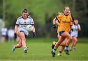 7 March 2024; Bláithín Nic Cathail of Ulster University in action against Kira Byrne of DCU Dochas Eireann during the 2024 Ladies HEC Lagan Cup final match between DCU Dochas Eireann and Ulster University, Belfast at MTU Cork. Photo by Stephen Marken/Sportsfile