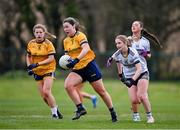 7 March 2024; Katie Carragher of DCU Dochas Eireann in action against Lucy Conroy of Ulster University during the 2024 Ladies HEC Lagan Cup final match between DCU Dochas Eireann and Ulster University, Belfast at MTU Cork. Photo by Stephen Marken/Sportsfile