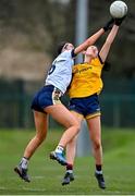 7 March 2024; Ashling Goodwin of Ulster University in action against Anna Lyons of DCU Dochas Eireann during the 2024 Ladies HEC Lagan Cup final match between DCU Dochas Eireann and Ulster University, Belfast at MTU Cork. Photo by Stephen Marken/Sportsfile
