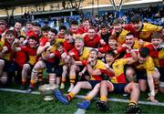 7 March 2024; St Fintan's High School players celebrate with the cup after the Bank of Ireland Vinnie Murray Cup final match between St Fintan's High School and The High School at Energia Park in Dublin. Photo by Tyler Miller/Sportsfile
