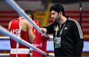 7 March 2024; Shehzad Ahmed Azam of Afghanistan with Afghanistan coach Shakeb Ahmed Azam before their Men's 63.5kg Round of 32 bout against Salvador Flores Luque of Spain during day five at the Paris 2024 Olympic Boxing Qualification Tournament at E-Work Arena in Busto Arsizio, Italy. Photo by Ben McShane/Sportsfile