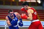 7 March 2024; Ahmed Azam Shehzad of Afghanistan, right, in action against Salvador Flores Luque of Spain during their Men's 63.5kg Round of 32 bout during day five at the Paris 2024 Olympic Boxing Qualification Tournament at E-Work Arena in Busto Arsizio, Italy. Photo by Ben McShane/Sportsfile
