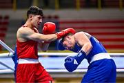 7 March 2024; Ahmed Azam Shehzad of Afghanistan, left, in action against Salvador Flores Luque of Spain during their Men's 63.5kg Round of 32 bout during day five at the Paris 2024 Olympic Boxing Qualification Tournament at E-Work Arena in Busto Arsizio, Italy. Photo by Ben McShane/Sportsfile