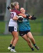 7 March 2024; Orla Fleming of Maynooth University in action against Lucie Gilmartin of University of Limerick during the 2024 Ladies HEC Donaghy Cup final match between Maynooth University and University of Limerick at MTU Cork. Photo by Stephen Marken/Sportsfile