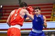 7 March 2024; Ali Habibinezhad of Iran, left, in action against Patris Mughalzai of Great Britain during their Men's 63.5kg Round of 32 bout during day five at the Paris 2024 Olympic Boxing Qualification Tournament at E-Work Arena in Busto Arsizio, Italy. Photo by Ben McShane/Sportsfile