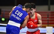 7 March 2024; Emilio Garcia of USA, right, in action against Erislandy Alvarez of Cuba during their Men's 63.5kg Round of 32 bout during day five at the Paris 2024 Olympic Boxing Qualification Tournament at E-Work Arena in Busto Arsizio, Italy. Photo by Ben McShane/Sportsfile
