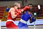 7 March 2024; Mohamed Rachem of Belgium, left, in action against Omari Jones of USA during their Men's 71kg Round of 32 bout during day five at the Paris 2024 Olympic Boxing Qualification Tournament at E-Work Arena in Busto Arsizio, Italy. Photo by Ben McShane/Sportsfile