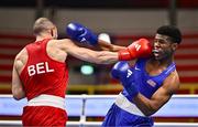 7 March 2024; Mohamed Rachem of Belgium, left, in action against Omari Jones of USA during their Men's 71kg Round of 32 bout during day five at the Paris 2024 Olympic Boxing Qualification Tournament at E-Work Arena in Busto Arsizio, Italy. Photo by Ben McShane/Sportsfile