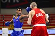 7 March 2024; Mohamed Rachem of Belgium, right, in action against Omari Jones of USA during their Men's 71kg Round of 32 bout during day five at the Paris 2024 Olympic Boxing Qualification Tournament at E-Work Arena in Busto Arsizio, Italy. Photo by Ben McShane/Sportsfile