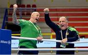 8 March 2024; Ireland coaches Damian Kennedy, left, and Zaur Antia celebrate after Grainne Walsh of Ireland is declared victorious in her Women's 66kg Round of 32 bout against Stefanie Von Berge of Germany during day six at the Paris 2024 Olympic Boxing Qualification Tournament at E-Work Arena in Busto Arsizio, Italy. Photo by Ben McShane/Sportsfile